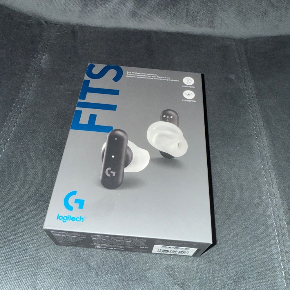 Logitech FITS Wireless Earbuds in Black and White
